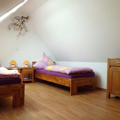 Schlafzimmer der Ferienwohnung 4 im Ferienhaus Eckeberg