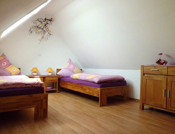 Schlafzimmer der Ferienwohnung 4 im Ferienhaus Eckeberg