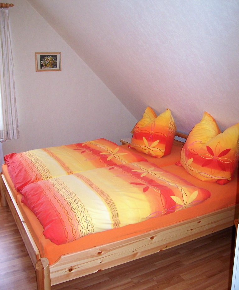 Schlafzimmer der Ferienwohnung 4 im Ferienhaus Eckeberg